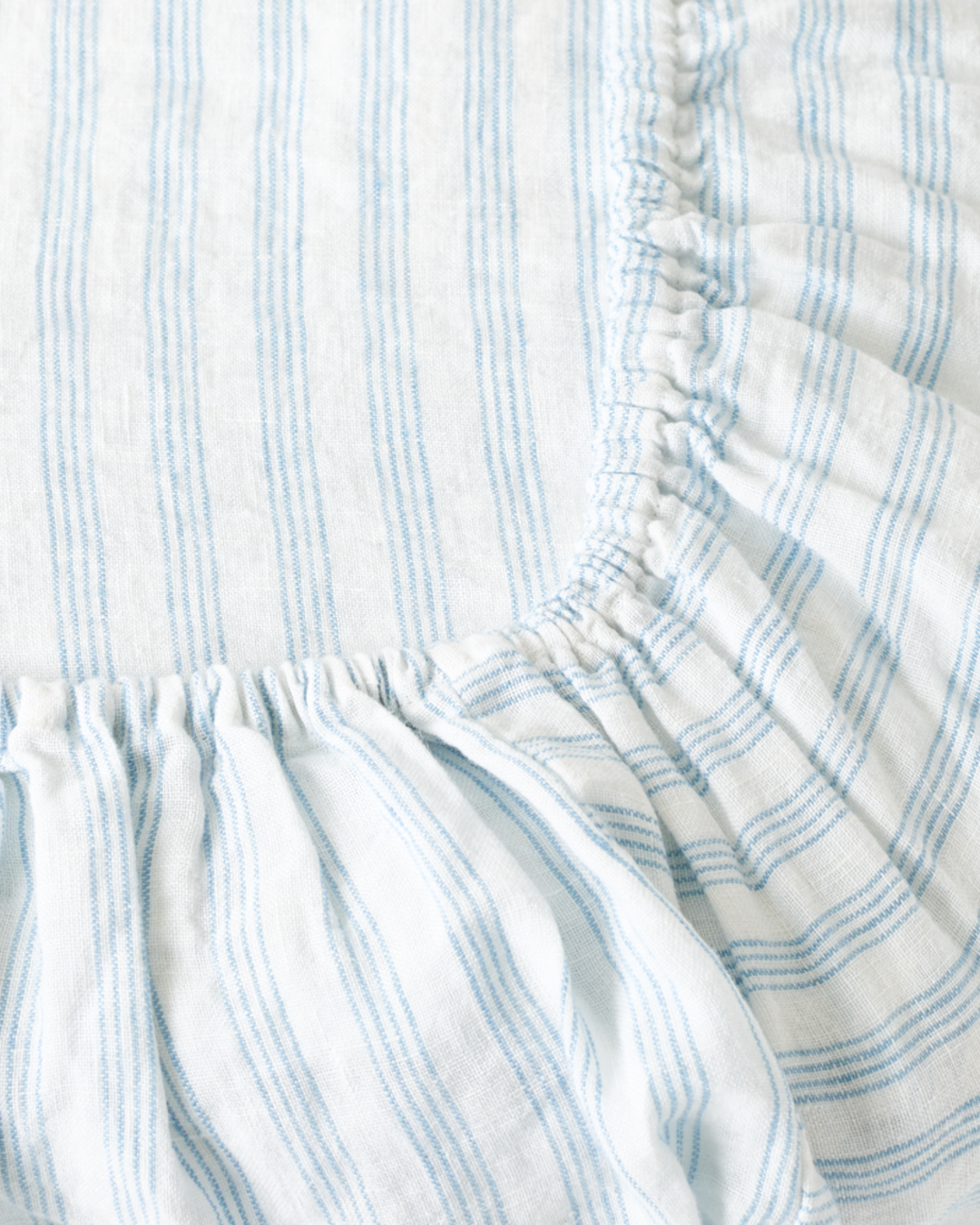 Merci - Washed linen fitted sheet - Primary Blue Paintbrush Stripes