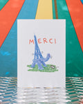 Merci x Shia Mcshia - Postcard featuring the Eiffel Tower and a mouse