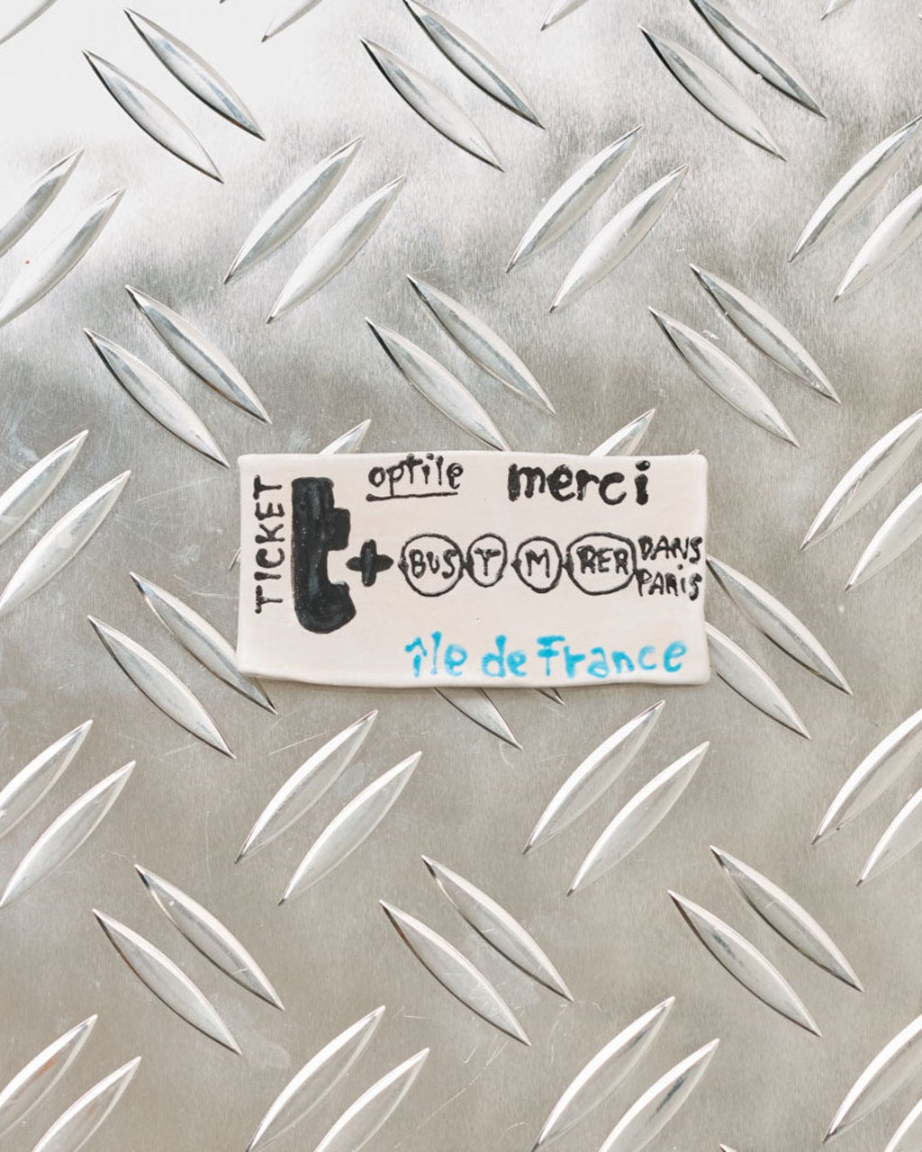 Merci x Michela Castagnaro - Ticket De Métro En Céramique