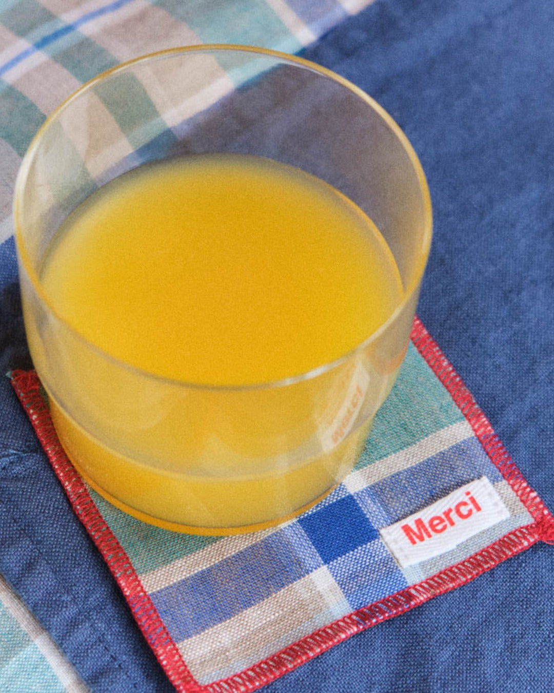 Merci - Set of 6 washed linen coasters - Library Checks