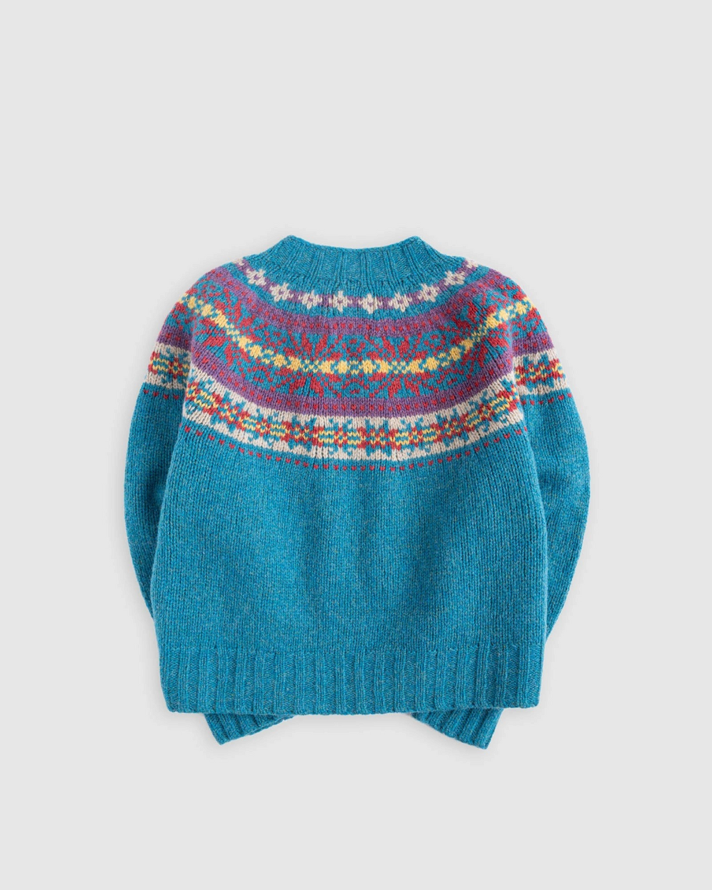 Pull Merci Paris Howlin' en laine Shetland bleue avec motif jacquard Fair Isle traditionnel et col rond