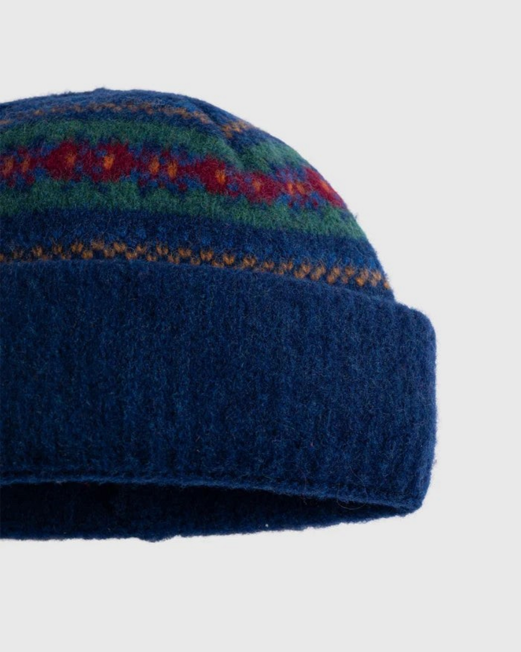 Bonnet en laine d'agneau brossée Merci Paris bleu avec motifs graphiques colorés et revers côtelé