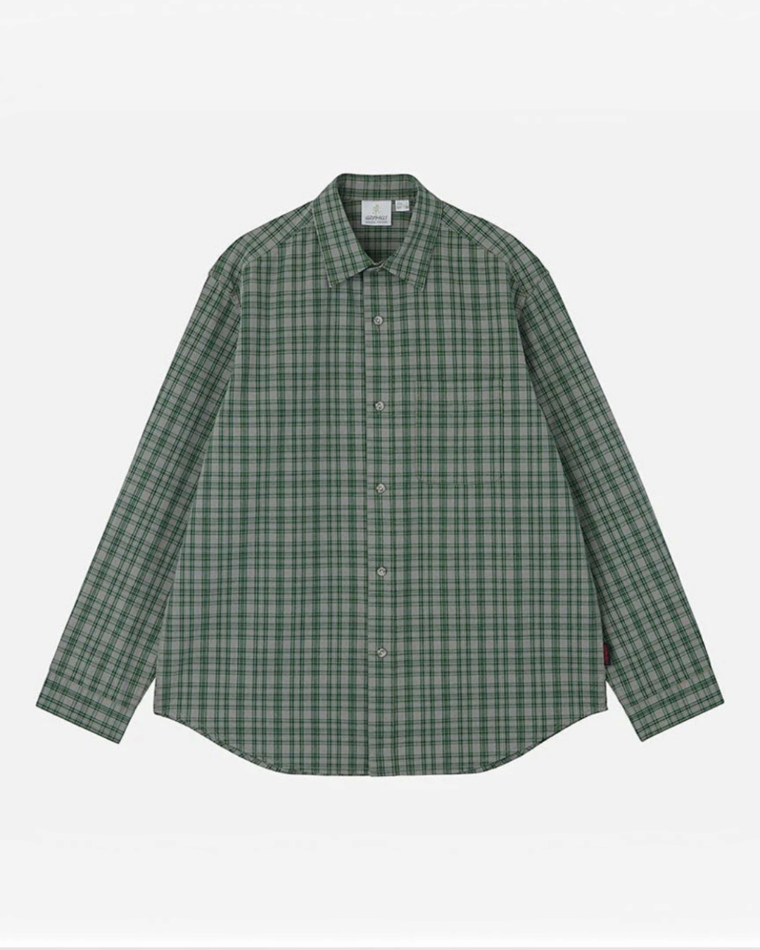 Chemise Gramicci par Merci Paris en coton épais à carreaux verts et gris avec poche poitrine et coupe décontractée