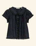 Black blouse Merci Paris Dôen Karina in ramie with scalloped collar, puff sleeves and star mother-of-pearl buttons