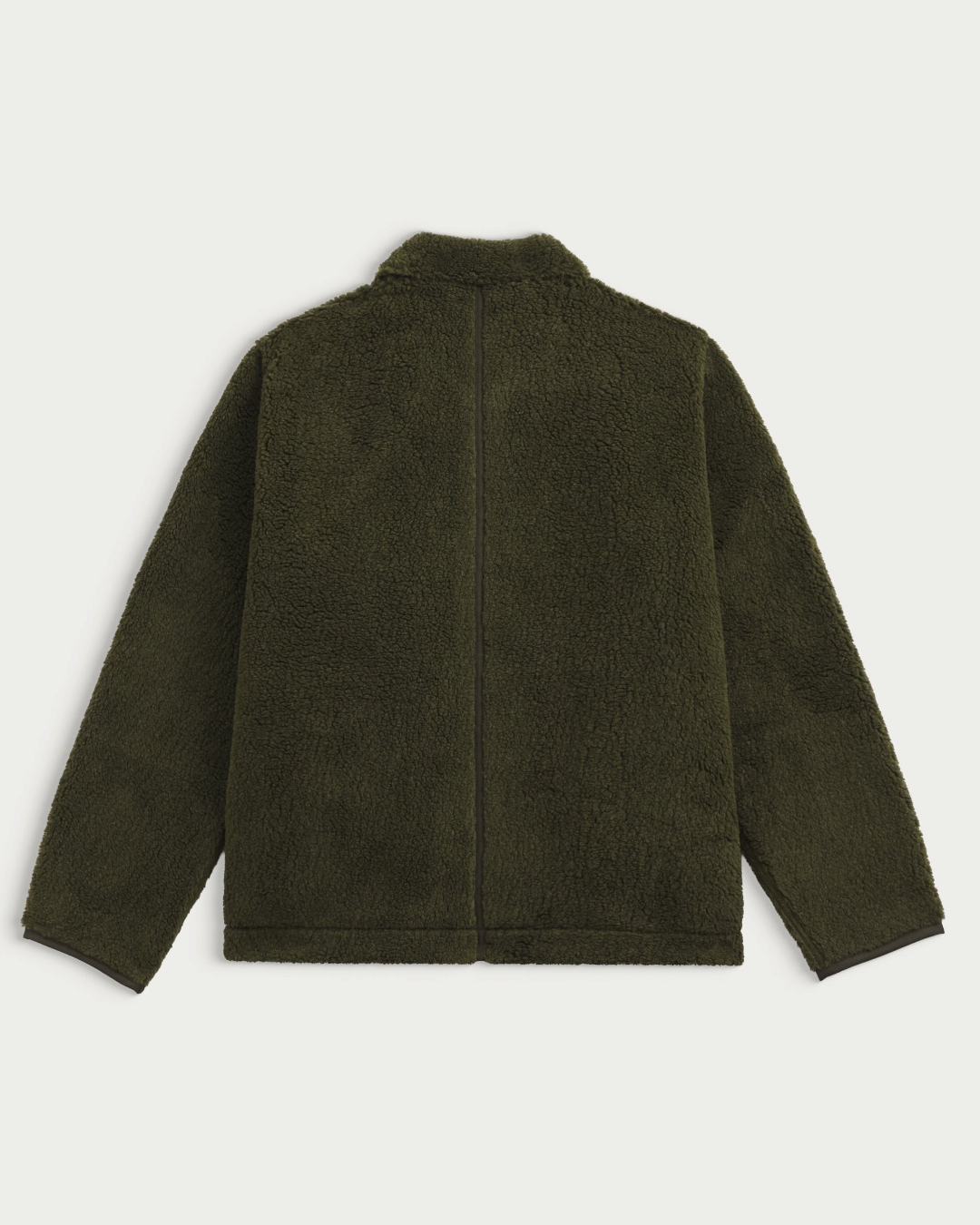 Vue arrière de la veste polaire kaki Homecore Keafur avec détail vertical au dos, disponible chez Merci Paris