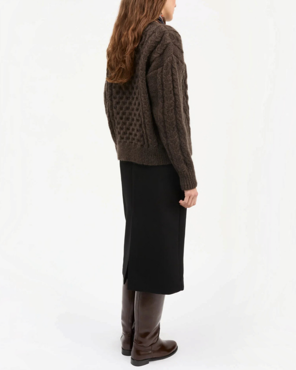 Lennox cardigan Merci Paris in dark brown wool with cable knit worn by a woman from behind