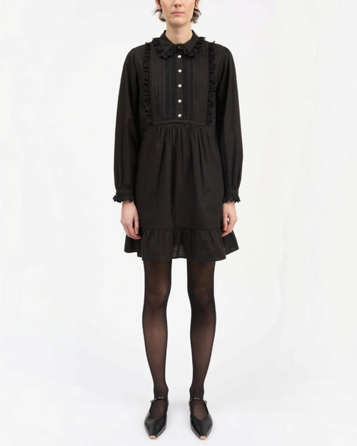 Short black dress Merci Paris Skall Studio in organic cotton with ruffled collar and long gathered sleeves