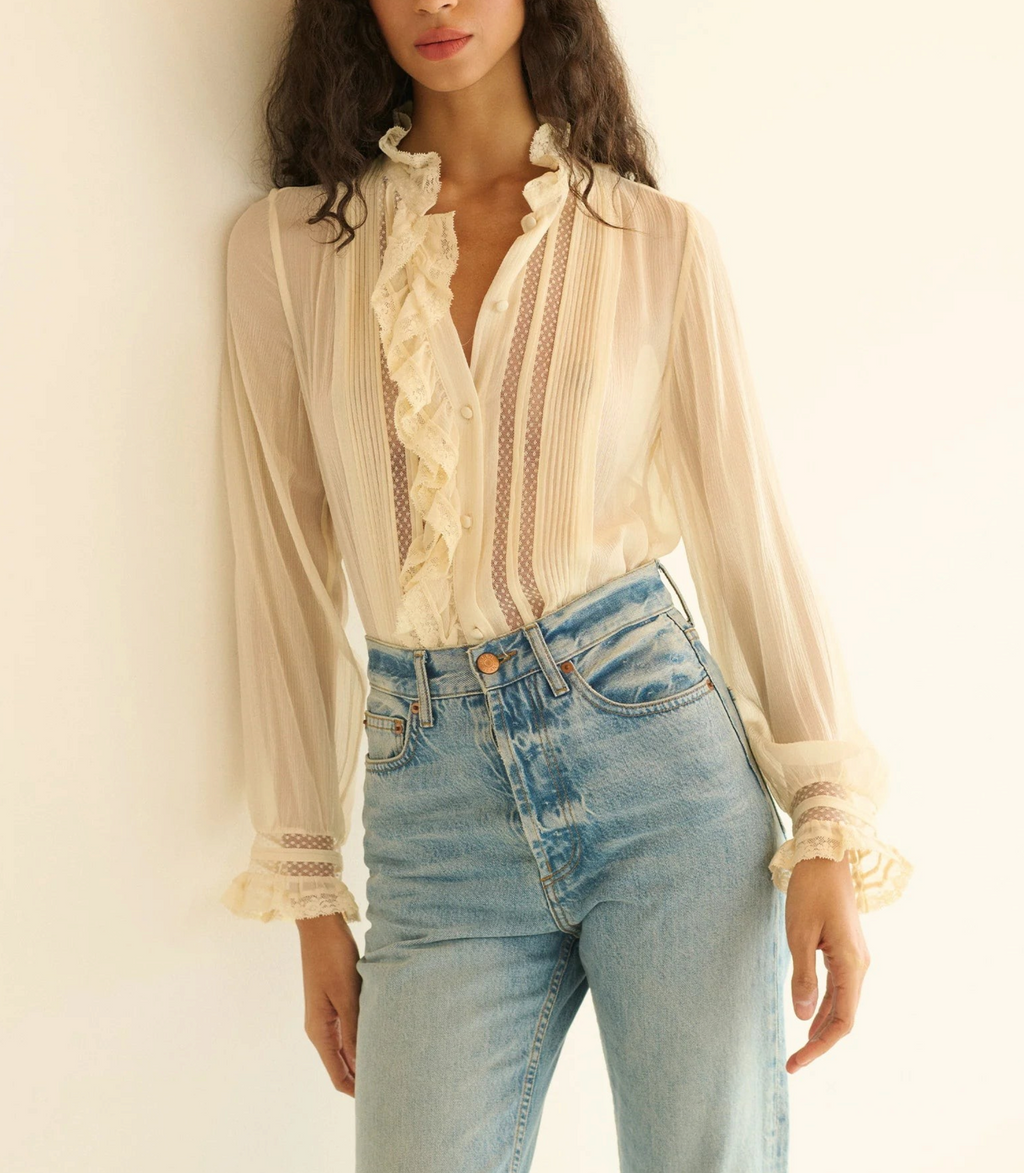 Magdeleine blouse Merci Paris blouse in ecru silk with ruffles, lace and ribbed pleats worn by a model