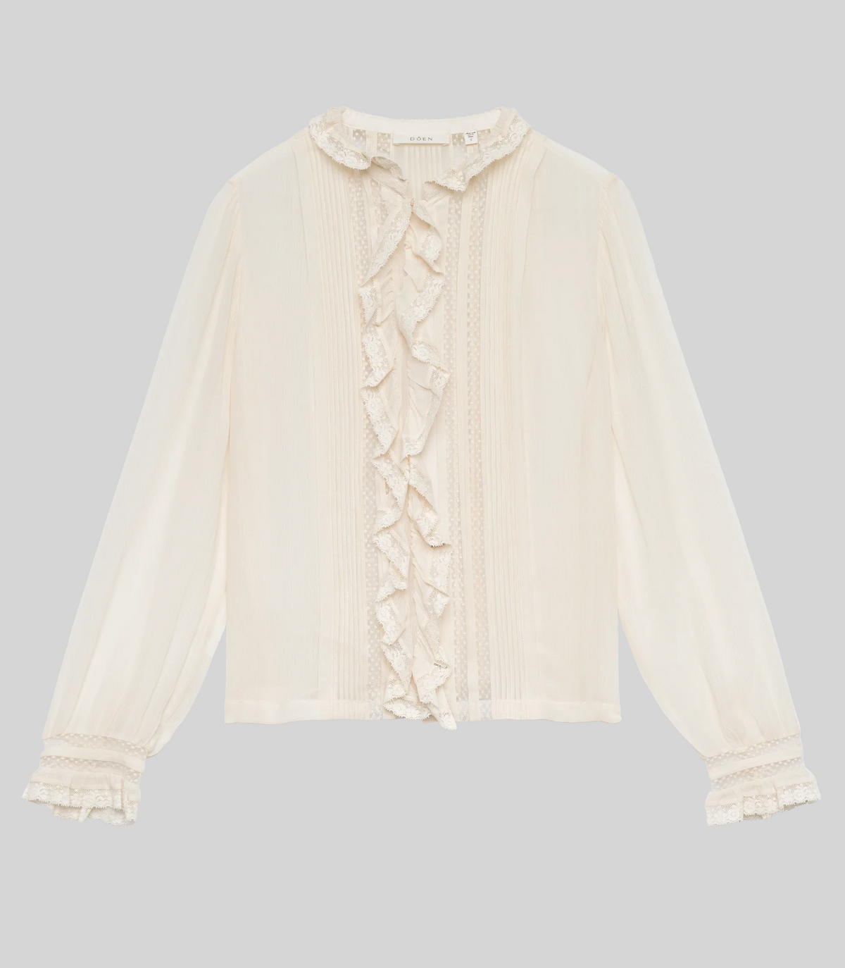 Blouse Merci Paris Dôen Magdeleine blouse in ecru silk with ruffles, delicate lace and ribbed pleats on the front