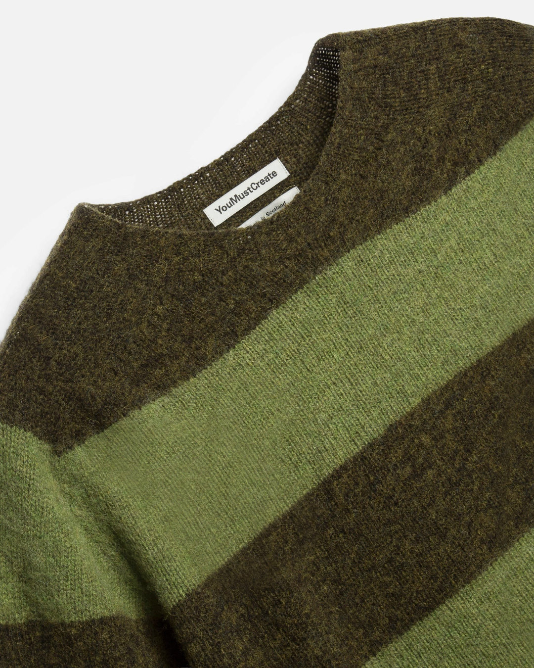Pull YMC Suedehead rayé vert en laine d'agneau brossée avec col rond, disponible chez Merci Paris