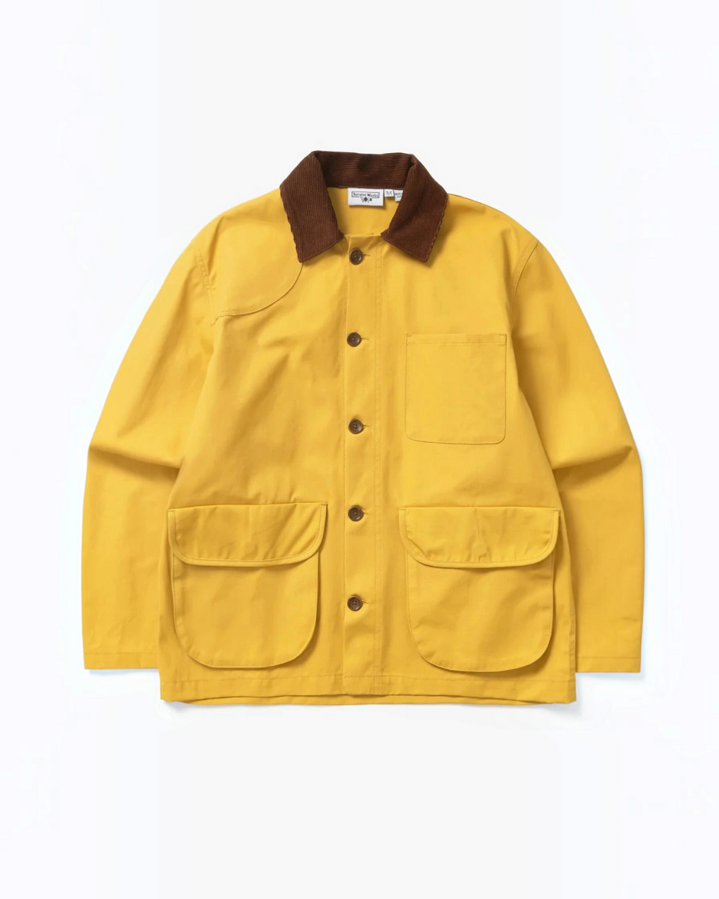 Veste cirée jaune Merci Paris Service Works en coton biologique avec col contrastant en velours côtelé marron