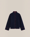 Veste Marianne Merci Paris en velours de coton bleu marine avec passepoil contrastant et boutons recouverts