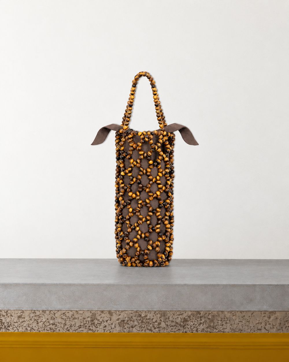 Cordera - Sac Perles Œil De Tigre - Marron – Vue sur banc