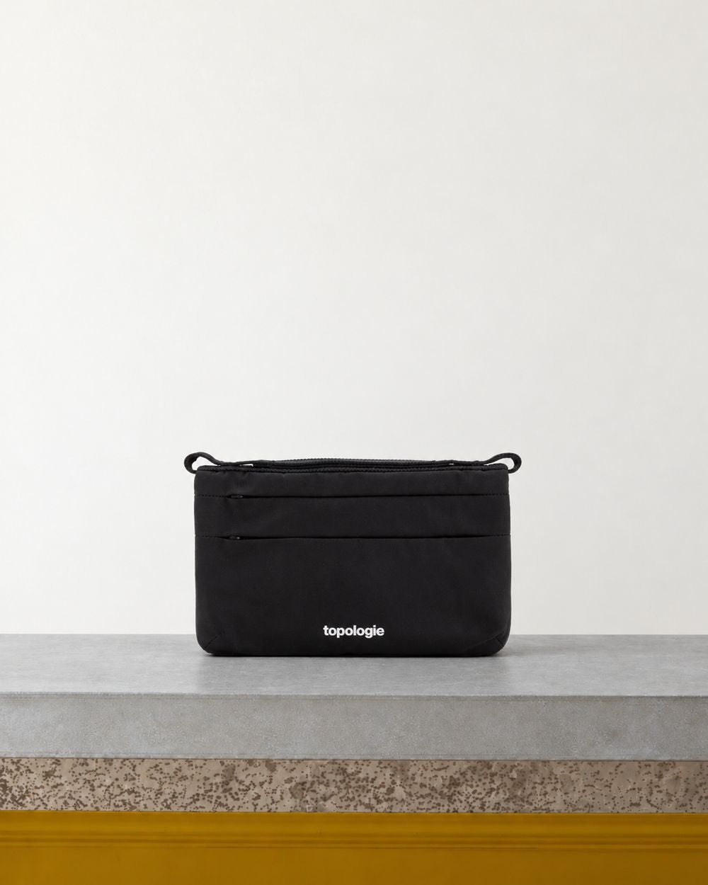 Topologie - 90 Phone Bag - Black - Bench View
