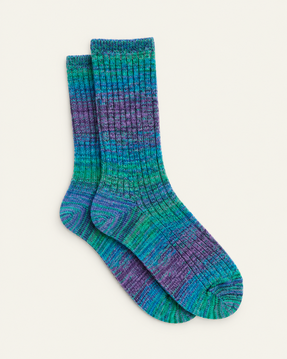 Anonymous ISM - Chaussettes Splash - Bleu — paire en packshot sur fond écru